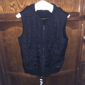 Sleeveless vest with hoodie
